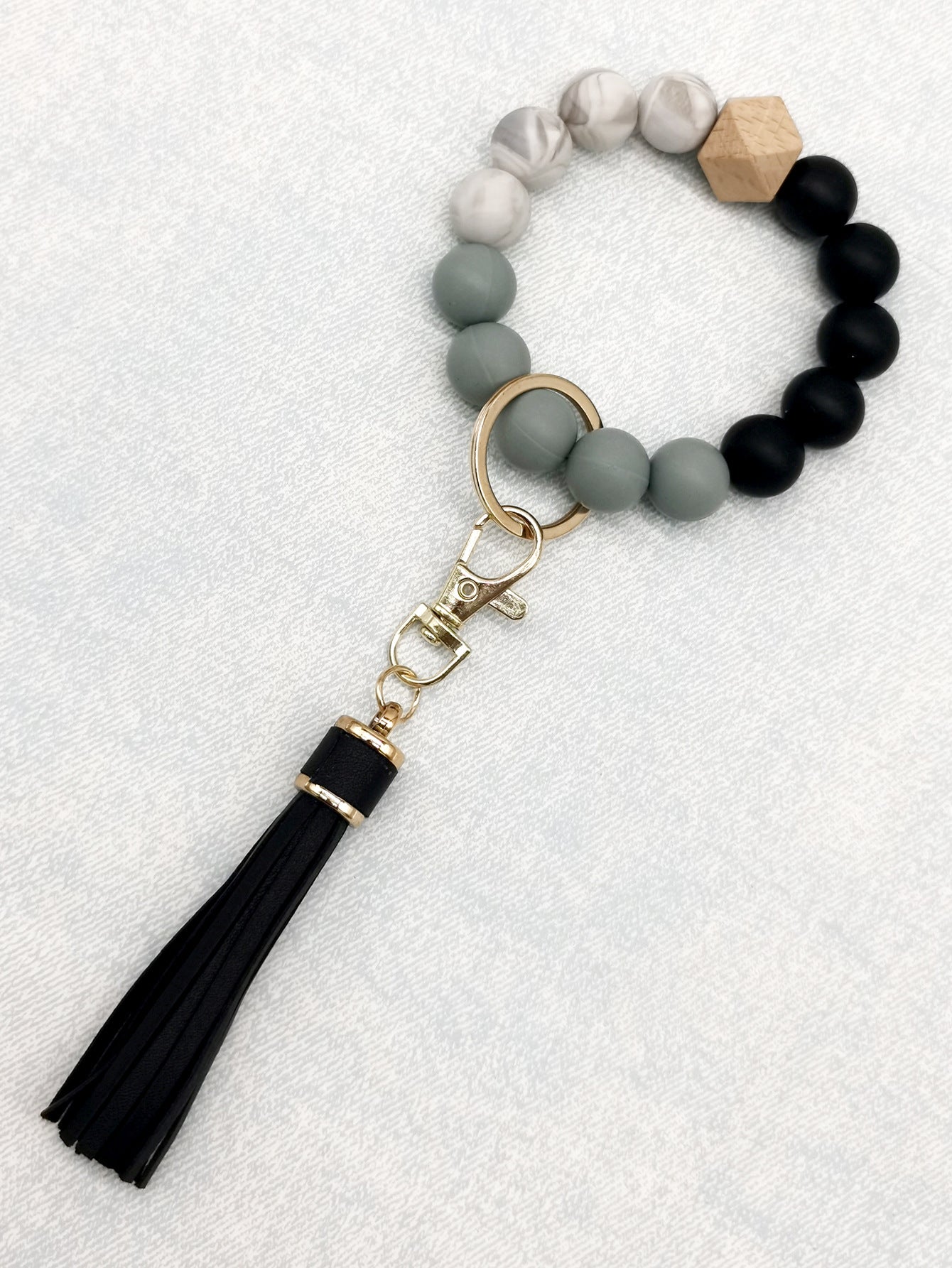 Pulsera de cuentas de silicona con borlas al por mayor llavero de muñeca